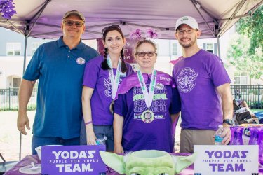 Image of Shannon and her walk team at a tent