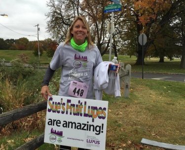 Sue and walk sign